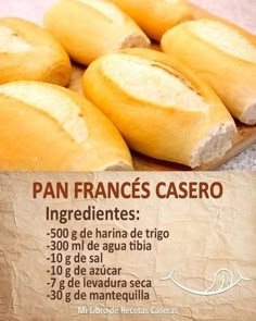 some breads are sitting on top of a wooden cutting board with the words pan frances's casero in spanish