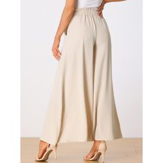 The wide-leg beach pants feature a drawstring waist, a tassel tie, and two side pockets, which are great for a perfect summer look. The soft fabric of the pants is drapey, even in the summer. It is not stuffy, showing elegant charm while relaxing. These fashionable and casual pants are perfect for spring, summer, and fall. Pair them with sandals or a hat for a glamorous look! Trousers Women Wide Leg, Sailor Pants, Wide Leg Palazzo Pants, Flowy Pants, Beach Pants, Ladies Of London, Bottom Clothes, Pull On Pants, Women's Casual