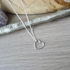 A little heart for a little love.An 11mm Sterling Silver Heart pendant hung on a Sterling Silver Chain Necklace.✭ CUSTOMIZE YOUR PIECE ✭► Choose your chain length 16in or 18in options for No Additional Charge! Don't see the length you need? Check out our Custom Length Upgrade: https://www.etsy.com/ca/listing/198366701/custom-chain-length-upgrade► Upgrade to a Thicker Chain here:https://www.etsy.com/ca/SilverMooseArts/listing/817185940/chain-upgrade-sterling-silver-chain► You can also personalize Everyday Heart Necklace With Open Heart Beads, Dainty Open Heart Charm Necklace With Heart Beads, Everyday Open Heart Necklace With Heart Beads, Minimalist Double Heart Charm Necklaces With Heart Beads, Adjustable Open Heart Necklace With Heart Charm, Minimalist Double Heart Charm Necklaces, Adjustable Open Heart Charm Necklace, Minimalist Open Heart Charm Necklaces For Mother's Day, Simple Heart Charm Necklace For Mother's Day