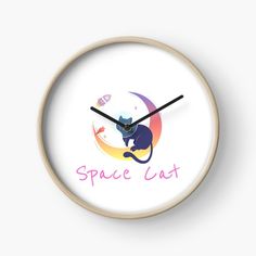 a clock with the words space cat on it's face and an image of a cat