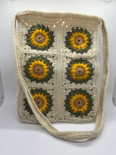 Crafted with love and attention to detail, this crocheted Sunburst granny square bag is a perfect blend of style and functionality. This item is handcrafted by me (Jenna) and is 12 x 9.5 x 1.5in in size. If you are ordering a custom color, please be as specific as possible. Handmade Square Crochet Bag For Gift, Rectangular Crochet Everyday Bag, Rectangular Crochet Bag For Everyday, Hand Knitted Rectangular Crochet Bag For Crafting, Everyday Rectangular Crochet Yarn Bag, Rectangular Crochet Yarn Bag For Everyday Use, Bohemian Granny Square Crochet Bag For Crafting, Square Cream Crochet Shoulder Bag, Cream Crochet Square Shoulder Bag