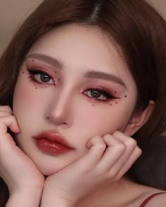 Red Kpop Makeup, Red Eye Makeup Gems, Enhypen Concert Makeup Ideas, Red Makeup With Gems, Korean Red Makeup, Asian Halloween Makeup, Red And Black Douyin Makeup, Red Makeup Asian, Christmas Makeup Looks Asian