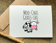 a card that says moo - chas grass - tas with a cow on it