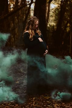 Spooky Maternity Pictures Family, Halloween Inspired Maternity Photos, Maternity Witch Photoshoot, Creepy Maternity Pictures, Halloween Maternity Shoot Ideas, Pregnant Witch Art, Goth Maturnity Shoot, Halloween Themed Maternity Shoot, Halloween Gender Reveal Photoshoot