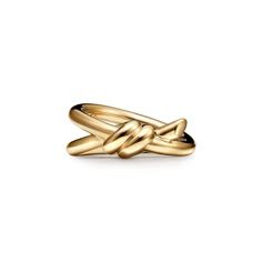 The entwined ends of Tiffany Knot’s signature motif symbolize the power of connections between people. Balancing strength and elegance, each Tiffany Knot design is a complex feat of craftsmanship. This ring is crafted with yellow gold and polished by hand for high shine. Wear on its own or partnered with classic silhouettes for an unexpected pairing. 18k yellow gold; Features Tiffany & Co. hallmark | Tiffany Knot Double Row Ring in Yellow Gold, Size: 4