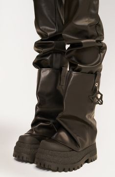 The piéce de resistance of your edgy-modern look, this bold hooded boot adds a substantial platform complemented with rubber toe and heel overlays that add durability to the distinctive style. Exclusive retailer Pull-on style Leather upper/textile lining/rubber sole Imported Oversized Boots, Cyberpunk Boots, Bunny Boots, Big Boots, Naked Wolfe, Lug Boots, Icon Shoes, Futuristic Fashion, Fashion Statements