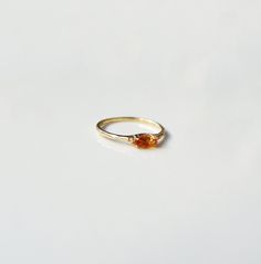 14k Gold Citrine Ring, 14k Gold Dainty Marquise Citrine Ring, 14k Gold Minimalist Citrine Ring, Stacking Citrine Ring Marquise Citrine Ring ✦ Product Features: ● Made to order ● Materials: Solid Gold ● Gold Kt: 9K, 10K, 14K, 18K  ● Gold color: Rose Gold, White Gold, and Yellow Gold ● Setting: Natural Citrine ● Total number of stones: 1 ● Total Citrine ctw: 0.20 ctw  ● Band width: 1.10mm ● Ready to ship: 7-10 business working days (excluding weekends) ✦ Gemstone Certificate: ● Absolutely, if you Citrine Marquise Ring, Orange Citrine Birthstone Rings, Citrine Birthstone Promise Ring In Fine Jewelry, Fine Jewelry Citrine Birthstone Promise Ring, Orange Topaz Promise Rings, Amber Topaz Birthstone Ring In Fine Jewelry Style, Orange Gemstone Promise Ring, Orange Prong Setting Ring For Promise, Orange Promise Ring With Prong Setting