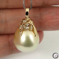 "Lovely designed pendant, made of solid 14K yellow gold with six- natural mine small accent diamonds and a organic natural BI-Color, south sea cultured pearl from Australia. The \"gorgeous\" genuine seawater pearl exhibits an excellent high luster and thick nacre with just a minimal natural birthmarks; refer to the photos of the actual pendant for detail. Style: Pendant Precious Metal: Solid 14k yellow gold Genuine Diamond: 6 pc / 0.030ctw. ------------------------------------------------------- Tahitian Pearl Earrings, Cultured Pearl Necklace, Pearl Types, Sea Pearls, Tahitian Pearls, Precious Metal, Pearl Size, Jewelry Projects, Cultured Pearls