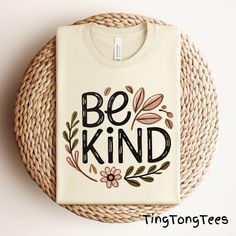 This "Be Kind" Floral Graphic Tee combines a beautiful floral design with an uplifting message of kindness. Perfect for spreading positivity in style, it's a great addition to any wardrobe or a thoughtful gift for loved ones. Embrace kindness with a touch of boho charm. Ideal for those who love bohemian style and aim to promote positivity and kindness in their everyday life. Relevant for holidays such as World Kindness Day, birthdays, or as a random act of kindness gift. 📢 Please check all phot Kindness Gifts, Kindness Day, World Kindness Day, Be Kind Shirt, Spreading Positivity, Message Positif, Floral Graphic, Kindness Shirts, Uplifting Messages