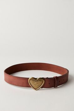 Designed to add a versatile, vintage-inspired touch to every look, this forever timeless belt is featured in a classic leather silhouette with western-style, metal heart buckle at center for the perfect finishing touch. | Corazon Leather Belt by Free People in Brown, Size: S/M Womens Western Belt, Belt Aesthetic, Cute Belts, Unique Belts, Belts Aesthetic, Clothing Aesthetics, Metal Heart, Brown Belt, Heart Eyes