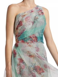 This elegant gown by Rene Ruiz Collection flaunts a fit-and-flare silhouette in a whimsical printed organza fabrication..One-shoulder neckline.Sleeveless.Back invisible zip closure.100% polyester.Lining: 100% polyester.Dry clean.Imported.SIZE & FIT.About 64' from shoulder to hem.Model measurements: 5'10' tall.Model is wearing a US size 4.This elegant gown by Rene Ruiz Collection flaunts a fit-and-flare silhouette in a whimsical printed organza fabrication.One-shoulder necklineSleevelessBack invisible zip closure100% polyesterLining: 100% polyesterDry cleanImportedSIZE & FITAbout 64' from shoulder to hemModel measurements: 5'10' tallModel is wearing a US size 4 Elegant Multicolor Dress With Asymmetrical Neckline, Silk Evening Dress With Floral Print And Fitted Bodice, One-shoulder Organza Gala Dress, One-shoulder Organza Dress For Gala, Silk Dress With Floral Print And Asymmetrical Neckline, Floor-length Floral Print Organza Dress, Fitted Organza Dress With Asymmetrical Neckline, Elegant Organza Dress With Asymmetrical Neckline, Formal Floral Print Organza Dress