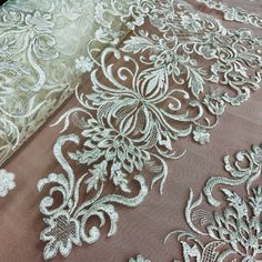 Be the envy at any special occasion with this beautiful Corded Bridal Lace Fabric Embroidered on 100% Polyester Net Mesh by Lace USA. The accented embroidery is a perfect addition to the corded lace fabric which comes in 5 sophisticated colors, making it ideal for wedding dresses, evening gowns, dance costumes, and quinceanera dresses. As the finest in corded couture lace, this product is sure to make you the center of attention when you strut your stuff in this elegant lace fabric. The high qua Quinceanera Crown, Corded Lace Fabric, For Wedding Dresses, Bridal Lace Fabric, Corded Lace, Bridal Tiara, Champagne Color, Dance Costume, Dresses Evening