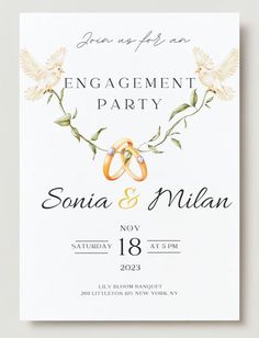 an engagement party card with two rings and flowers