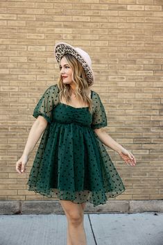 the everly babydoll dress will bring out your inner boho-bougie side. featuring a mini dress style, puffy sleeves, and polka dot pattern in fashionable hunter green, this dress is dreamy, stylish, and just a little bit sassy. transform your wardrobe with one effortless flourish! Plus Size Holiday Dress, Plus Size Babydoll Dress, Baby Doll Dress Outfit, Baby Doll Dress For Women, Fantasy Sewing, Sabrina Outfits, Dresses For Short Women, Dresses Plus Size Casual, Dress With Combat Boots