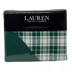 the lauren plaid sheet set is green and white, with black trims on it