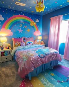 a bedroom decorated in blue, pink and yellow with a rainbow theme on the wall