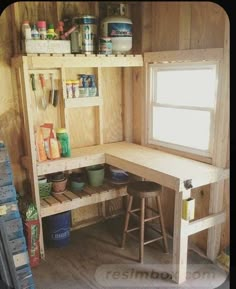 the inside of a shed with shelves and stools