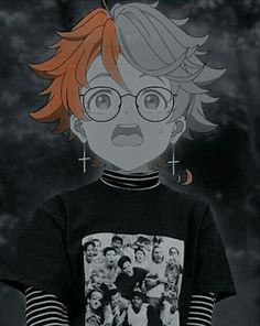 an image of a boy with red hair wearing glasses and a t - shirt that has photos on it