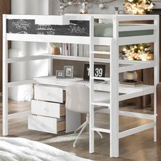 a white loft bed sitting next to a desk