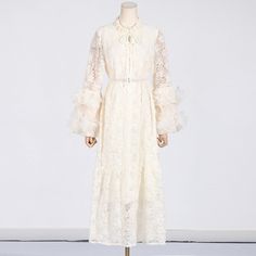 This sophisticated dress features delicate embroidery and a solid waist length design, creating an elegant and timeless look. Perfect for formal events or a night out, this dress is a must-have for any wardrobe. - Color: Beige, Pink- Style: A-line- Pattern Type: Solid- Sleeve Length: Long Sleeve- Length: Maxi- Fabric: Dacron- Details: Ruffles- Occasion: Casual, Formal- Gender: Women- Size: S, M, L, XL (Unit: cm) Size Shoulder Bust Waist Sleeve Hip Length S 38 100 102 60.5 110 130 M 39 104 106 61 French Palace, Delicate Embroidery, Sophisticated Dress, Solid Color Dress, Embroidery Lace, Line Dress, Color Dress, Daily Dress, Dress Maxi