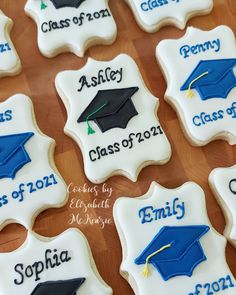 decorated cookies with graduation caps and names on them