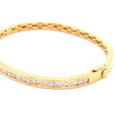 What's better than a yellow gold bangle? Diamond yellow gold bangle of course! You'll adore the channel-set sparkling diamond stones that enrich this bangle with brilliance. You can wear this fabulous bangle with absolutely anything. Metal: 18K Yellow GoldDiamond Weight: 1.35ct t.w.Diamond Shape: 34 Round Brilliant cutsSetting: ProngBangle Width: 56 x 46mm Bangle Diamond, Yellow Gold Bangle, Sparkling Diamond, Gold Bangle Bracelet, Gold Bangle, Channel Set, Diamond Shape, Sparkle Diamonds, Diamond Stone