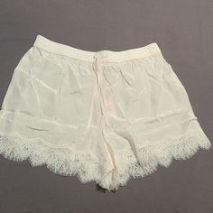 Bnwt, Satin Coco White Color. Size Small, Chemise Shorts, Very Comfy, Never Been Worn. Beautiful Lace On Bottom, As Shown/Sexy Cream Lace Trim Bottoms For Loungewear, Feminine Pajama Shorts For Daywear, Feminine Daywear Pajama Shorts, Feminine Shorts For Daywear, Feminine Short Pajama Shorts For Bedtime, Feminine Short Length Pajama Shorts For Daywear, Feminine Lace Lounge Bottoms, Sheer Feminine Bottoms For Summer, Sheer Feminine Summer Bottoms