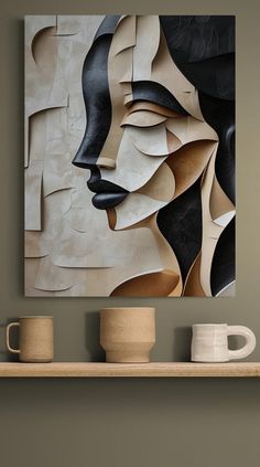 an abstract painting on the wall next to two coffee mugs and a wooden shelf