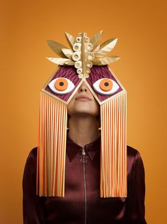 a woman with an unusual mask on her head