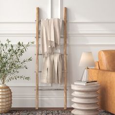 a living room with a chair and rug on the floor