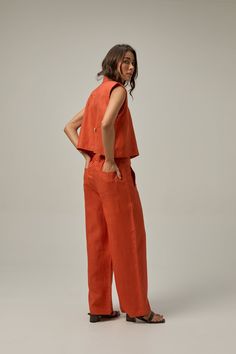 Made of 100% linen fabric, this pant has an elastic waist for added comfort and a straight cut to lengthen the legs. Wear it at the waist or at the hips for a more modern look. Our Reverie collection represents the idea of reconnecting with one's creative self and finding inspiration through moments of deep contemplation and imaginative thinking. COMPOSITION AND CARE Material: 100% linen Linen is one of the most sophisticated natural fiber fabrics. It does not hold or block air, nor does it have Modern Relaxed Fit Summer Pants, Modern Loose Fit Summer Pants, Modern Linen Wide-leg Pants, Modern Wide-leg Linen Pants, Modern Linen Wide Leg Pants For Summer, Modern Wide Leg Linen Pants, Modern High-waisted Linen Wide Leg Pants, Modern Linen Trousers, Modern Linen Straight Pants