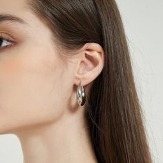 Minimal and classic silver hoop earrings. Your go to every-day earrings that adds a chic and vintage look to your outfit. The earrings are made from 316L surgical level stainless steel. A perfect addition to your jewelry collection! ………………………………….D E T A I L S• Materials: Stainless steel• Inner Diameter: 15mm• Outter Diameter: 25mm• This product is hypoallergenic, water and tarnish resistant Trendy Sterling Silver Hoop Earrings, Classic Metal Huggie Earrings, Chic Hypoallergenic Silver Earrings, Polished Finish Hoop Earrings, Chic Polished Silver Hoop Earrings, Chic Silver Hoop Earrings With Polished Finish, Silver Tarnish Resistant Huggie Earrings, Classic Stainless Steel Hoop Huggie Earrings, Elegant Stainless Steel Huggie Earrings