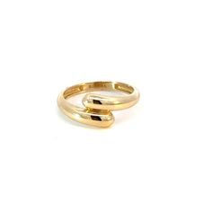 Prepare to bask in the glow of admiration! Our Solid Rendezvous Ring is more than just a piece of jewelry, it’s the meeting point for casual and everyday elegance. Crafted in 14K Gold you will love the smooth contours and unique feminine silhouette. It's ideal design makes it versatile enough to complement any outfit, from casual jeans and a tee to an evening dress. You will love all the ways you will wear it. Pairs beautifully with our Solid Rendezvous Hoop Earrings.

Size: 8mm (W)
14K Solid Go Modern Twist Yellow Gold Bypass Ring, Modern Twist Yellow Gold Bypass Ring For Formal Occasions, Modern 14k Gold Bypass Ring For Formal Occasions, Minimalist Yellow Gold Bypass Ring For Formal Occasions, Modern Yellow Gold Bypass Ring For Promise, Modern Yellow Gold Bypass Ring, Minimalist Polished Bypass Ring For Formal Occasions, Modern Twist 14k Gold Bypass Ring For Formal Events, Elegant Gold Bypass Ring With Round Band