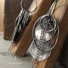 "Earrings are totally made of oxidized silver 925  Dimensions: Length: 4.33\" (11cm) Silver elements: 0.28\" - 1.26\" (0.7 - 3.2 cm) single earrings weight: 10 g Thank you for visiting!" Silver Hammered Sterling Silver Linear Earrings, Minimalist Hand Forged Metal Earrings, Modern Hand Forged Long Drop Jewelry, Oxidized Sterling Silver Drop Earrings, Unique Oxidized Sterling Silver Earrings, Modern Sterling Silver Linear Earrings With Hammered Detail, Modern Sterling Silver Hammered Linear Earrings, Modern Hammered Sterling Silver Linear Earrings, Modern Sterling Silver Jewelry With Oxidized Finish