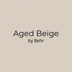 the words aged beige by behr are in black and white