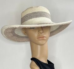 A true essential summer hat, this neutral color hat features a nice texture floppy wire brim, truly a fun hat to wear.  I design and create the hats from start to finish. size: Size & Fit *21"-22" circumference *31/2" brim Color * multi neutrals " off white, beige, taupe, beige" Care & Content  * Cotton * Wire  * Spot Clean *I  designed and constructed the hat from start to finish. Cream Hats One Size For Vacation, Lightweight Curved Brim Boater Hat, White Fedora For Warm Weather, Lightweight One Size Hat With Curved Brim, Lightweight Cream Hats With Curved Brim, Lightweight Cream Hat With Short Brim, Lightweight Cream Hat With Curved Brim, Cream Lightweight Sun Hat One Size Fits Most, Lightweight One Size Curved Brim Hat