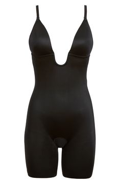 The ultimate low-back, low-front solution for when you’re getting glam, this bodysuit of sleek shaping fabric has adjustable and convertible straps. Control level: medium Includes clear straps and strap converter Adjustable, five-way convertible straps Lightly padded Plunging U-neck accommodates low necklines Low-back design with removable back clasp for versatility Easy Access™ gusset can be pulled to side for easy bathroom breaks Cling-free, single-layer shaping fabric offers lightweight, yet Elegant Second-skin Bodysuit With High-cut Leg, Elegant Second-skin High-cut Leg Bodysuit, Elegant Low-cut Bodysuit With Built-in Bra, Elegant Second-skin Backless Bodysuit, Elegant Sculpting Backless Shapewear, Black Low-back Shapewear Bodysuit, Elegant Low Back Shapewear With Built-in Bra, Sleek Backless Shapewear With Lined Body, Sleek Lined Backless Shapewear