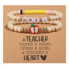 three wooden beaded bracelets with an apple and teacher's name on them