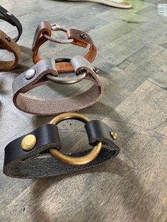 Roughly 3/4" wide solid Buffalo leather  ring accent Available in different color straps, and antique brass, gunmetal grey, antique silver, and snake ring Please message me if you need help with sizing or having trouble with strap color options Will add two holes for adjustment, more available on request Leather Wristbands, Leather Ring, Snake Ring, Gunmetal Grey, Buffalo Leather, Bijoux Diy, Leather Cuffs, Braided Bracelets, O Ring