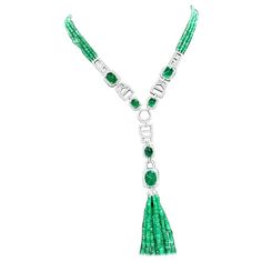 An exquisite necklace in Art Deco design, so refined, particular, a very adorable style. Necklace come in 18K gold with emeralds beads , and 40 pieces of Natural Zambian Emeralds, extra fine quality, spectacular color , in perfect cabochon oval cut , of 40,50 carats, and 774 pieces of natural diamonds in round brilliant cut , of 5,50 carats, F color VS clarity, very sparkly. Piece of high jewelry. Handcrafted by artisan goldsmith. Excellent manufacture and quality of stones . Complete with AIG report. Whosale price . Note : on my shipment, no taxes. Adorable Style, 18k Gold Necklace, Emerald Bead, Zambian Emerald, Multi Strand Necklace, Style Necklace, Art Deco Design, High Jewelry, Zambia