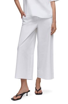 Run errands or relax over the weekend in these clean, crisp culottes cut from flowy cotton and styled with handy pockets. Pull-on style Back elastic waist On-seam pockets 100% cotton Machine wash, line dry Imported White Cropped Wide Leg Cotton Pants, Chic Cotton Straight Culottes, Summer Straight Leg Cotton Culottes, Summer Cotton Culottes With Straight Leg, Straight Leg Cotton Culottes For Summer, Elegant Cotton Culottes, Summer Cotton Wide Leg Work Pants, Relaxed Fit Cotton Wide-leg Culottes, Spring Cropped Wide Leg Loungewear Pants