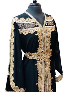 A beautiful and intricate Morrocan style Kaftan abaya. Designed is heavy golden design. Satin Under piece and chiffon top layer. Design comes down the center and along the sleeve.  Comes with matching belt. Luxury Traditional Black Kaftan, Black Floor-length Kaftan For Weddings, Festive Black Kaftan With Gold Embroidery, Luxury Black Floor-length Kaftan, Black Embroidered Bollywood Kaftan, Abaya Black, Kaftan Abaya, Golden Design, Cool Journals