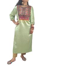 Experience Fashionable elegance with this Mashroo Cotton Silk Kutchi hand embroidered mirror work Jacket crafted from superior cotton silk blend for comfort and breathability. The Kutchi hand embroidered on its front crafted by artisans of Kutch which reflects of colourful Kutch. Look & feel your best with this timeless piece. Mirror Work Jacket, Pista Green Colour, Afghani Dress, Pista Green, Work Women, Silk Kurta, Work Jacket, Women Kurta, Straight Kurta