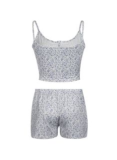 Liora Eyelet Lace Cami Set Unwind in style with the Jamisyn eyelet lace cami set from Alees Fashion. This charming set is crafted from soft, breathable fabric that ensures maximum comfort while exuding an effortlessly chic vibe. The delicate eyelet lace detailing adds a touch of elegance to the classic cami and shorts combo, making it perfect for lounging at home or a casual day out. The cami top features adjustable spaghetti straps for a personalized fit, while the shorts are designed with a co Spring Casual Camisole Set, Casual Loungewear Sets With Lace Trim, Casual Spring Sets With Lace Trim, Casual Sets With Lace Trim For Spring, Casual Summer Camisole Set, Summer Sleepwear Cami Set, Casual Summer Sets With Lace Trim, Summer Camisole Sets With Lace Trim, Summer Camisole Set For Daywear