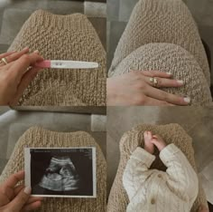 a woman is holding an x - ray in her lap and pointing at it with both hands