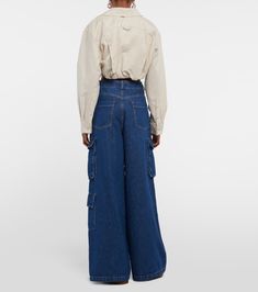 Hailey High Rise Denim Cargo Pants in Blue - The Frankie Shop | Mytheresa Oversized Wide Leg Cargo Jeans With Pockets, High Waist Relaxed Fit Cargo Jeans For Work, High-waist Relaxed Fit Cargo Jeans For Workwear, Spring Wide Leg Jeans With Flap Pockets, Oversized Straight Leg Bottoms With Cargo Pockets, Relaxed Fit Utility Jeans For Fall, High Rise Oversized Bottoms With Pockets, Oversized High-rise Bottoms With Pockets, Oversized Straight Leg Utility Pants