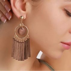 Circle Decor Wooden Tassel Drop Earrings Product Measurement Eardrop Height: 3.2 Inches Eardrop Width: 1 Inch Material: Wood Zinc Alloy Studs 2-3 Day Priority Mail Shipping Usps Elegant Brown Dangle Tassel Earrings, Circle Decor, Tassel Drop Earrings, Earrings Color, Material Wood, Brown Gold, Priority Mail, Zinc Alloy, 1 Inch