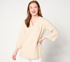 Simple-yet-stylish, this gauzy cotton top will be a mainstay in your summer wardrobe. Bell-shaped sleeves add dimension and create light and airy movement, while frayed edges give this tunic an undone, cool-and-carefree appeal. From Belle Beach by Kim Gravel. Spring Beige Cotton Tunic, Beige Cotton Tunic For Spring, Cotton Tunic For Day Out With Relaxed Fit, Cotton Tunic With Relaxed Fit For Day Out, Cotton Split Neck Top For Summer, Cotton Split Neck Tops For Daywear, Cotton Split Neck Tops For Beach, Linen Split Neck Top For Summer, Summer Cotton Tunic For Spring