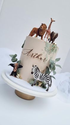 there is a cake with animals on it