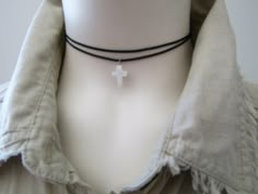 "This mini cross choker necklace features a natural white shell cross pendant hanging from sturdy polyester cord in black. The necklace finished off a stainless steel lobster clasp and comes with an additional 2\" extender chain. Simple and versatile. Great addition to your daily attire! White Shell Cross measures approx.0.39\"x0.55\"(10x14mm) ♥︎ Select your preferred necklace length at checkout. *Extender chain does not include in length. ♥ You will receive this necklace gift wrapped with an organza pouch. Please feel free to ask me if you have any questions. :) Check out my other items.   http://jaspersdream.etsy.com/" Cross Necklace Black, Grunge Chokers, Shell Cross, Necklace With Cross, Cross Choker Necklace, Cord Choker, Wire Crochet Jewelry, Cross Choker, Black Cord Necklace